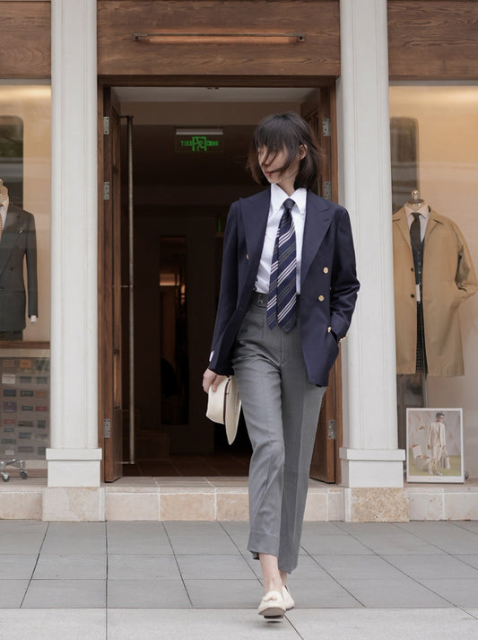 Moonland Ivy double breasted navy wool blazer, front view, wide and sharp peak lapels and gold buttons, business casual styling