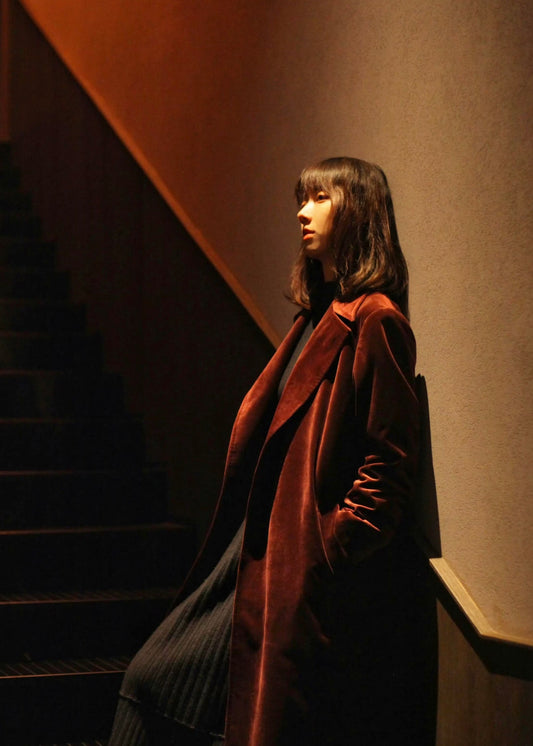 side look of Moonland Crimson Clutch Coat for women, wide fish mouth lapel, open front, side pocket, calf length