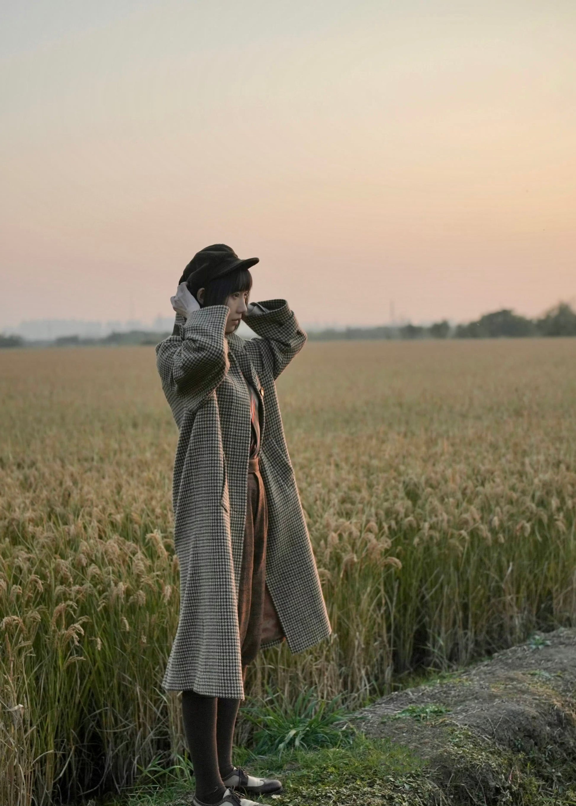 long balmaccan coat made with 100% wool with brown houndstooth or checkered pattern for women