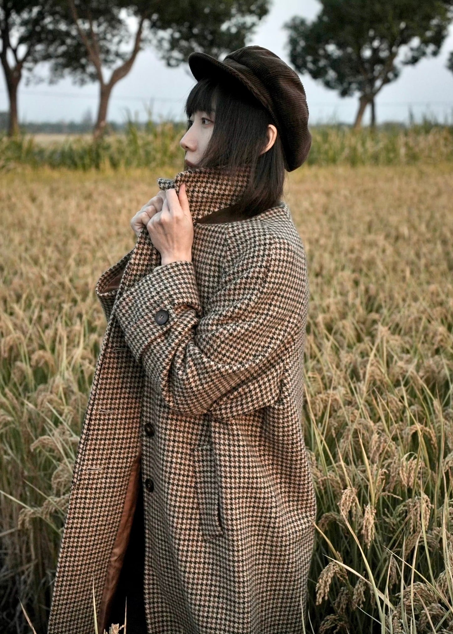 long balmaccan coat made with 100% wool with brown houndstooth or checkered pattern for women