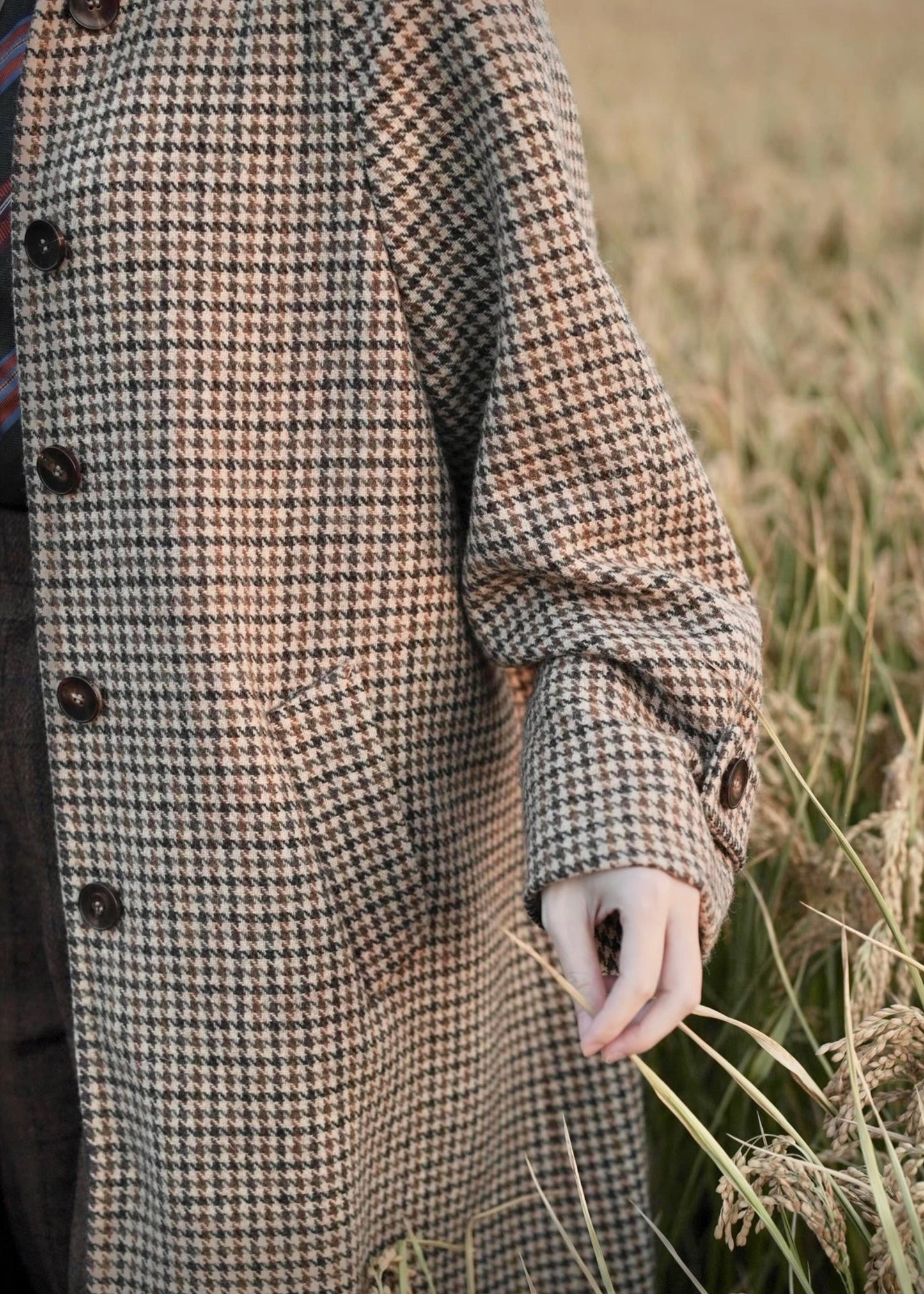 long balmaccan coat made with 100% wool with brown houndstooth or checkered pattern for women