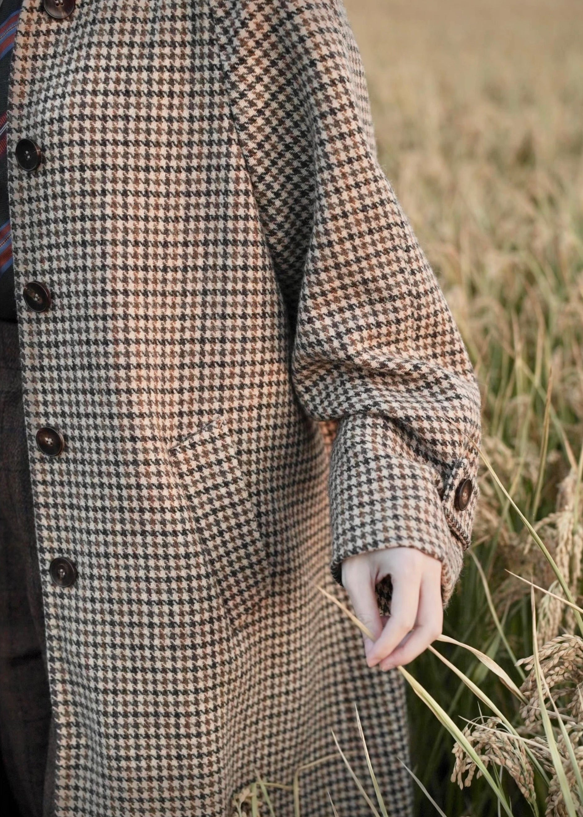 long balmaccan coat made with 100% wool with brown houndstooth or checkered pattern for women