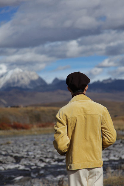 Moonland men in corduroy workwear back view #color_creamy-yellow