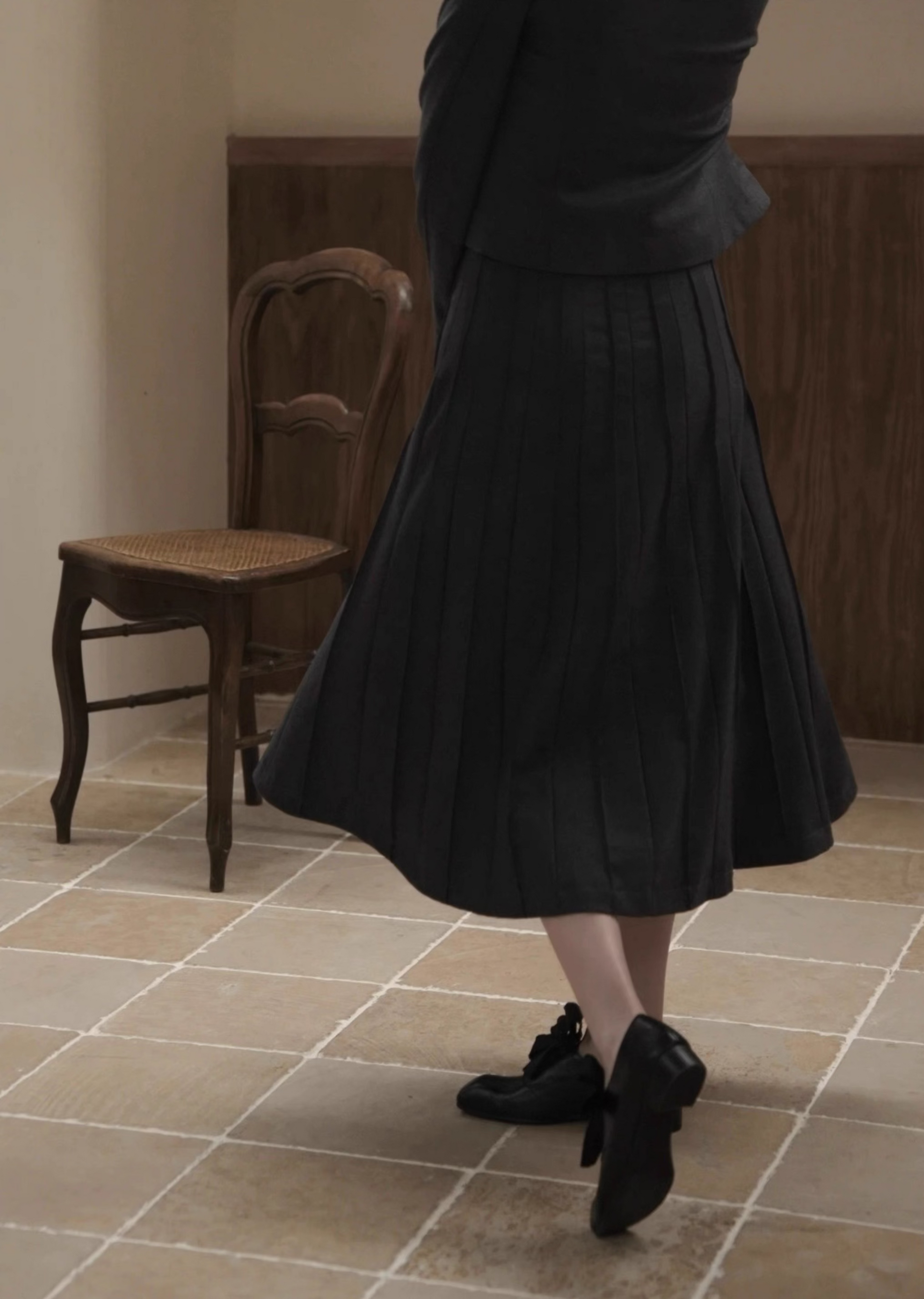 Moonland Eton Flannel Pleated Skirt back view, midi length, flowing drape