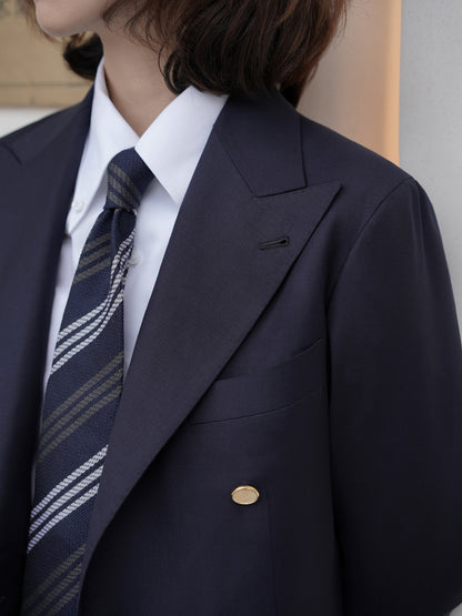 Moonland Ivy double breasted navy wool blazer, wide and sharp peak lapels and gold buttons, hand finished buttonholes and edges