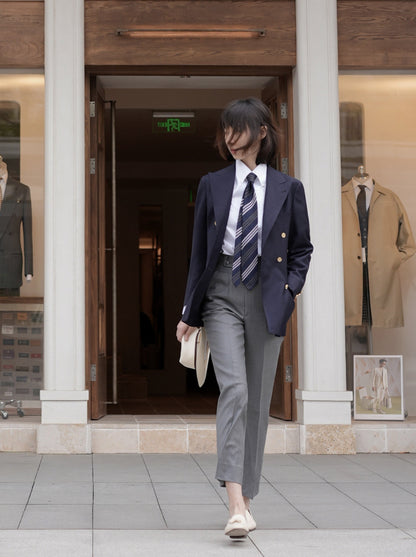 Moonland Ivy double breasted navy wool blazer, front view, wide and sharp peak lapels and gold buttons, business casual styling