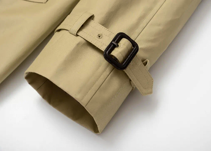 Close-up of Moonland Khaki trench coat with strapped cuff with a black buckle #color_khaki #color_cypress-green