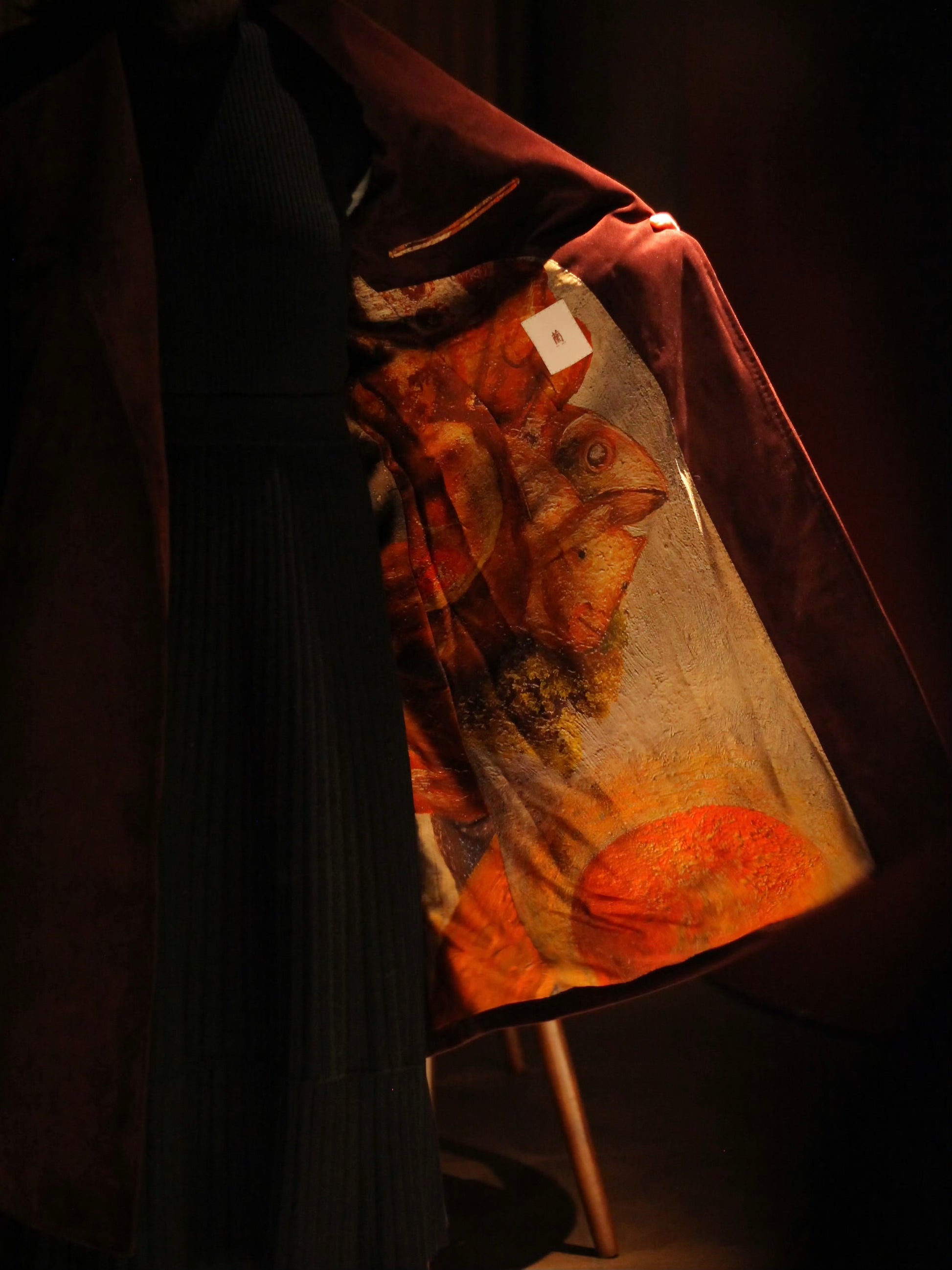Printed silk lining of the crimson clutch coat from Moonland for women