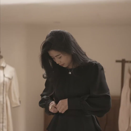 Moonland Ripple Pleat Silk blouse and midi skirt in black, clean waistband and flared hem, elegant flow for evening