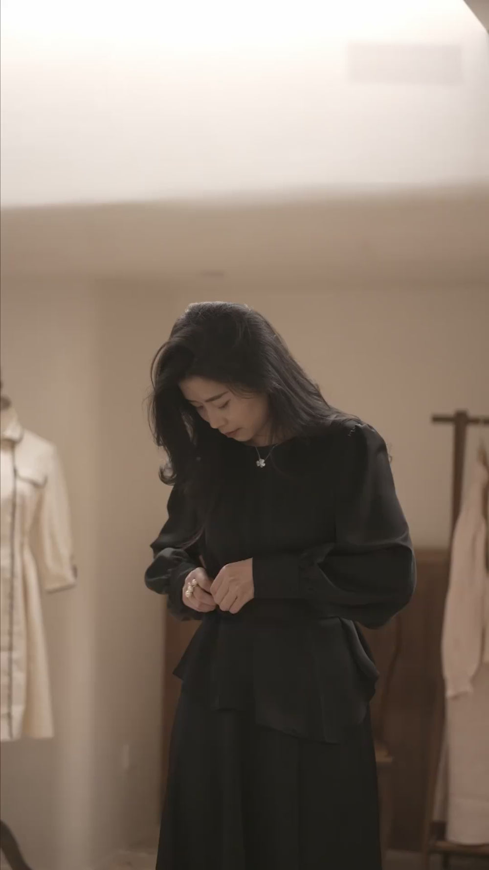 Moonland Ripple Pleat Silk blouse and midi skirt in black, clean waistband and flared hem, elegant flow for evening